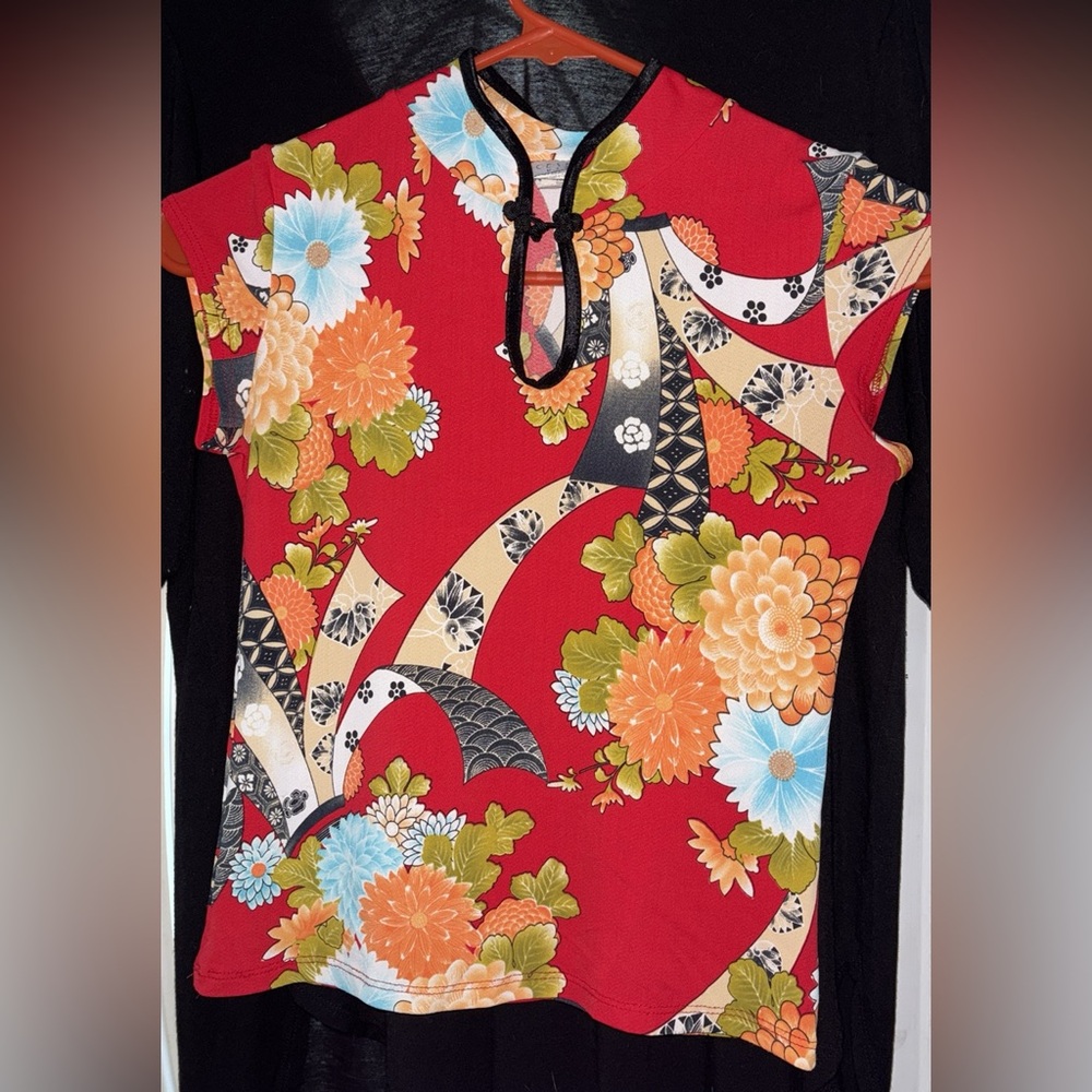 Vibrant Red and Orange Top with Unique Design